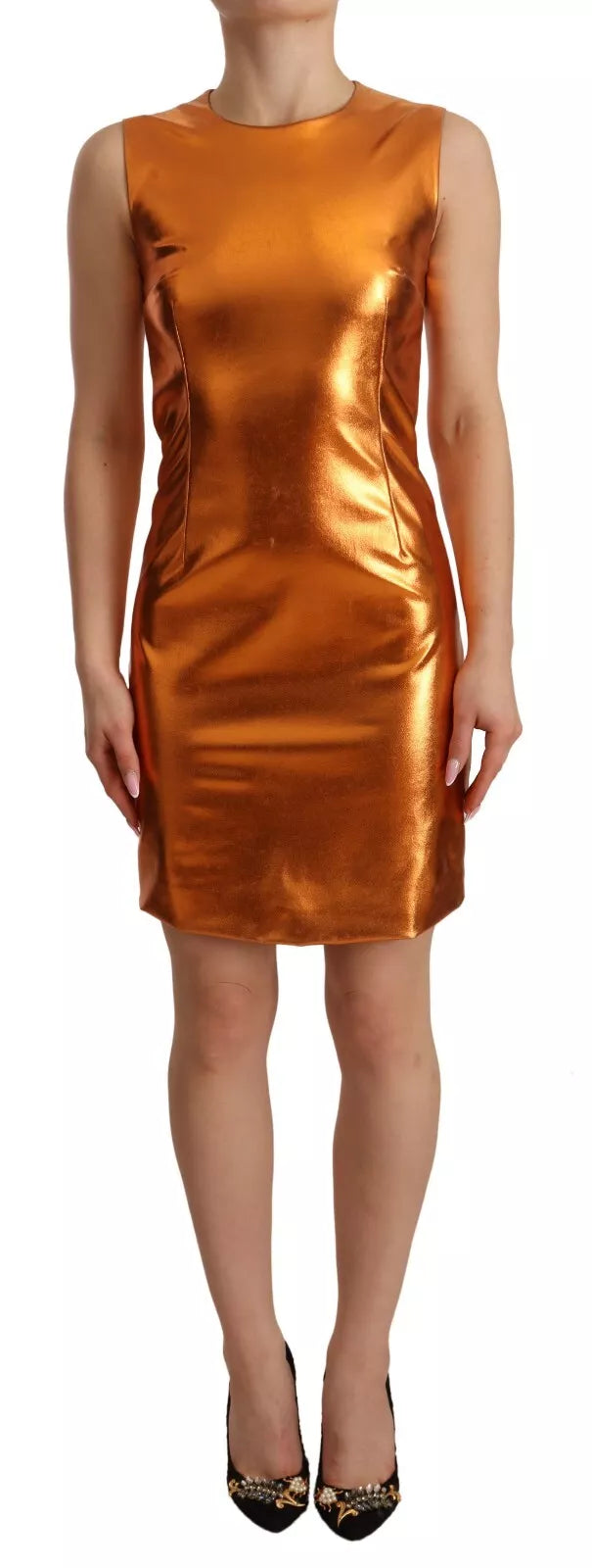 Elevate your allure with the Dolce & Gabbana Metallic Orange Sleeveless Sheath Dress, a masterpiece of Italian craftsmanship that embodies timeless elegance and sophistication.