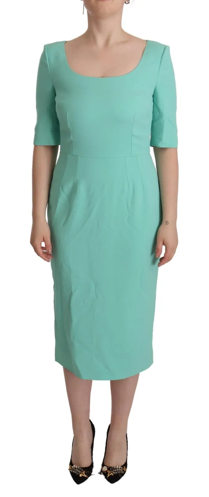 Indulge in the exquisite Dolce & Gabbana Mint Green Sheath Midi Dress, where luxurious materials and impeccable craftsmanship elevate your elegance for any occasion.