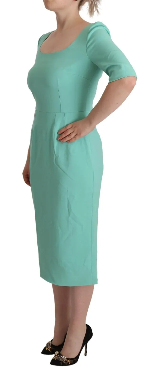 Elevate your wardrobe with the Dolce & Gabbana Mint Green Sheath Midi Dress, a masterpiece of exquisite craftsmanship and luxurious materials, perfect for any elegant occasion.
