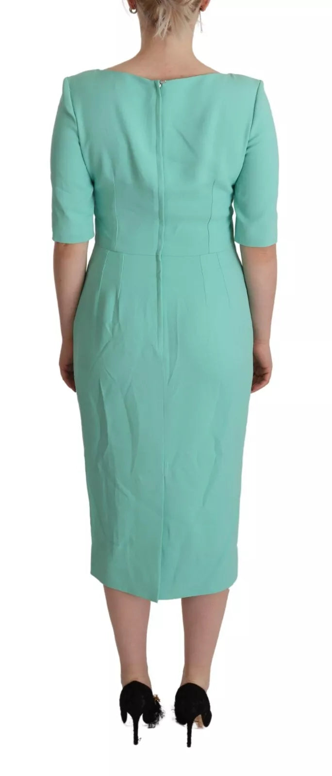 Indulge in the exquisite allure of the Dolce & Gabbana Mint Green Sheath Midi Dress, a masterpiece of Italian craftsmanship that embodies timeless elegance and refined sophistication.
