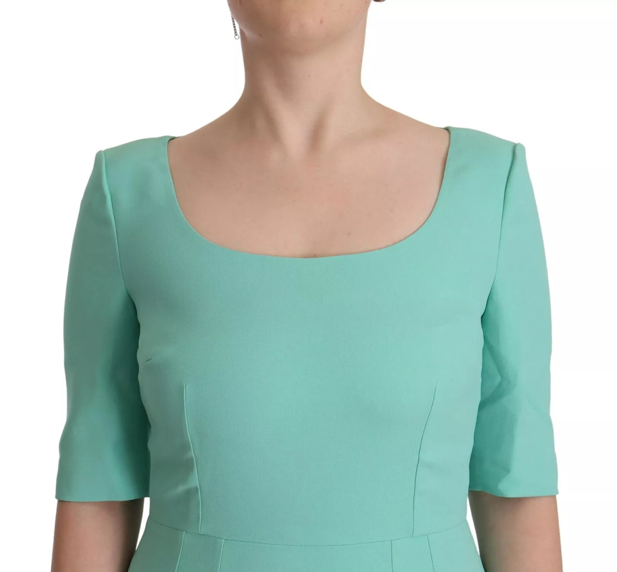 Elevate your elegance with the Dolce & Gabbana Mint Green Sheath Midi Dress, a masterpiece of exquisite craftsmanship and luxurious materials, perfect for any sophisticated occasion.