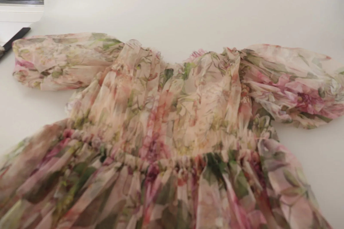 Experience the allure of Dolce & Gabbana's Multicolor Floral Print Long Maxi Gown, where exquisite Italian craftsmanship meets luxurious comfort, perfect for unforgettable moments.