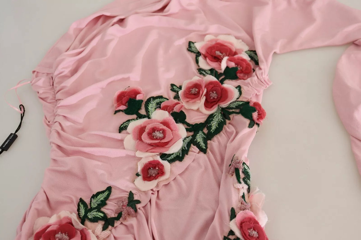 Elevate your elegance with the Dolce & Gabbana Pink Flower Embellished One Shoulder Dress, a masterpiece of Italian craftsmanship that embodies romance and sophistication.