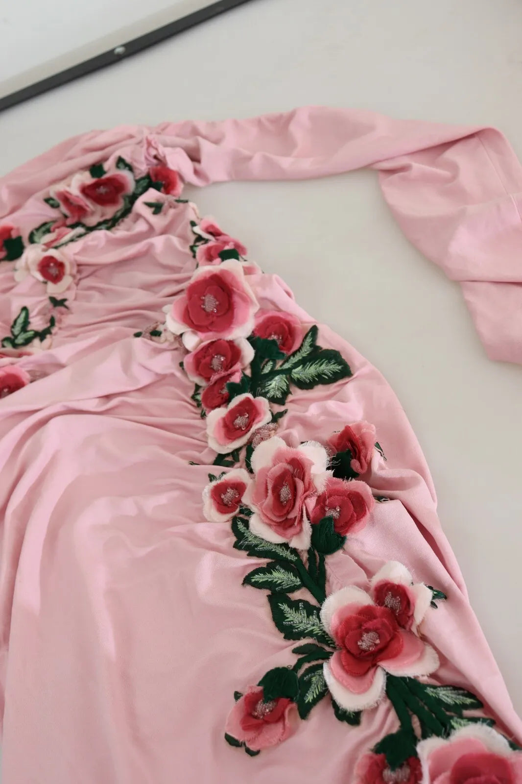 Experience the allure of the Dolce & Gabbana Pink Flower Embellished One Shoulder Dress, a masterpiece of Italian craftsmanship that embodies elegance and sophistication.