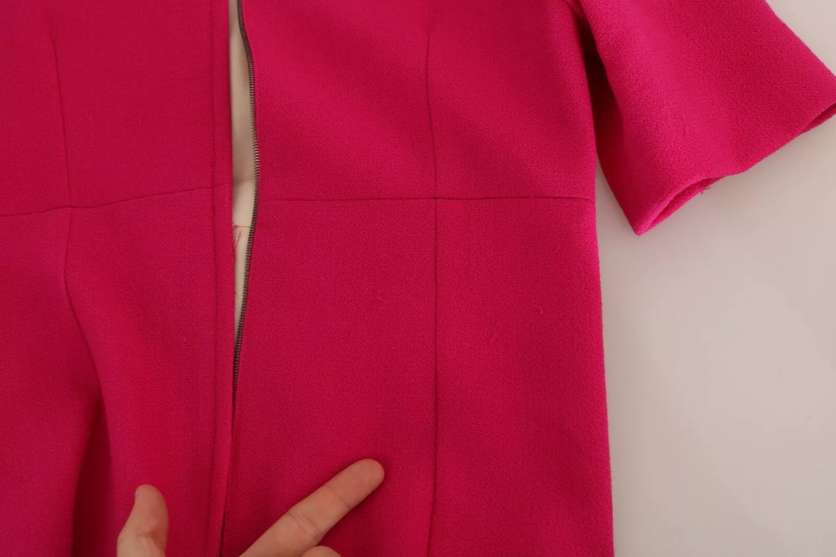 Indulge in the exquisite allure of the Dolce & Gabbana Pink Italia Forever Crystal Sheath Dress, a masterpiece of Italian craftsmanship that embodies luxury and elegance.