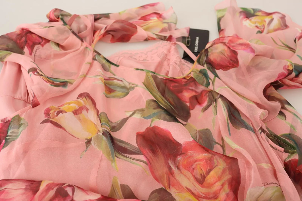 Experience the allure of Dolce & Gabbana's Pink Silk Floral Print Maxi Dress, a masterpiece of Italian craftsmanship that embodies elegance and timeless romance for the discerning individual.