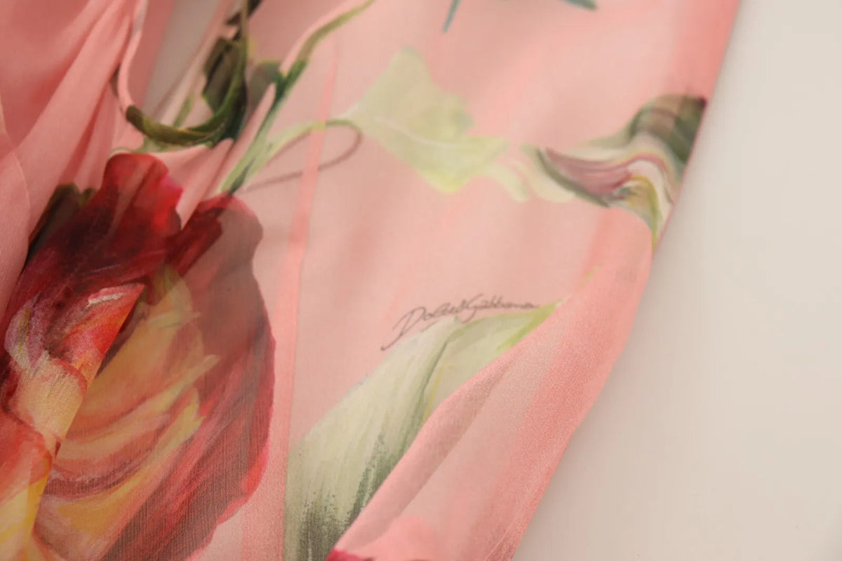 Experience the allure of Dolce & Gabbana's Pink Silk Floral Print Maxi Dress, a masterpiece of Italian craftsmanship that embodies timeless elegance and romantic sophistication.