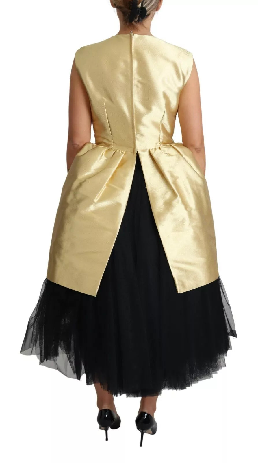 Indulge in the exquisite Dolce & Gabbana Gold Polyester Sleeveless A-line Tulle Dress, a masterpiece of Italian craftsmanship that embodies elegance and allure for every occasion.