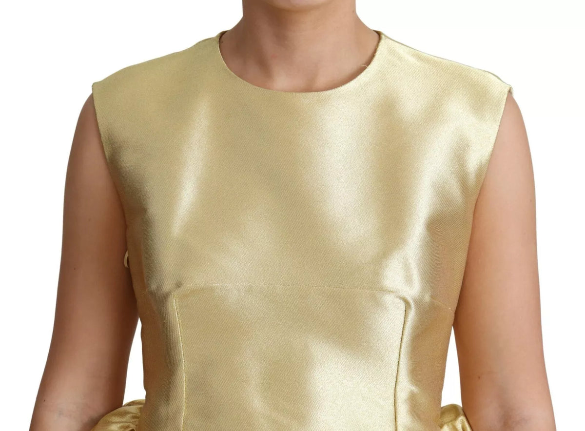 Indulge in the exquisite Dolce & Gabbana Polyester Gold Sleeveless A-line Tulle Dress, a masterpiece of Italian craftsmanship that embodies timeless elegance and allure.