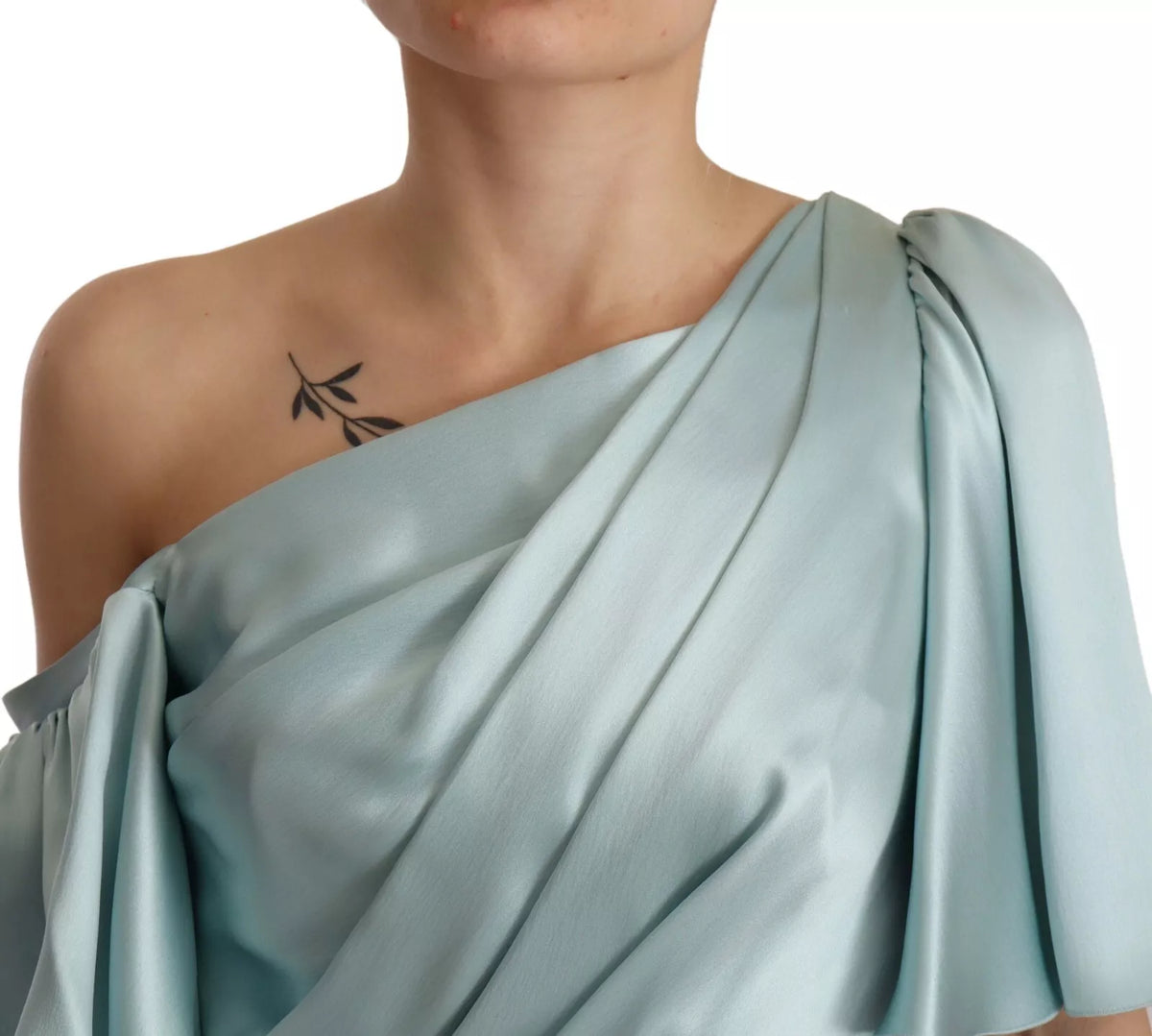 Indulge in the exquisite Dolce & Gabbana Silk Mint Green One Shoulder Midi Dress, where luxurious silk meets timeless elegance, perfect for those who command attention.