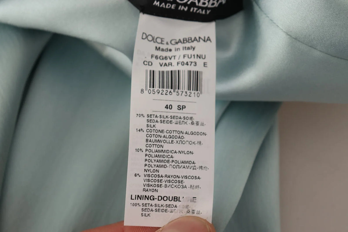 Elevate your elegance with the Dolce & Gabbana Silk Mint Green One Shoulder Midi Dress, a luxurious blend of silk and sophistication, perfect for timeless allure.