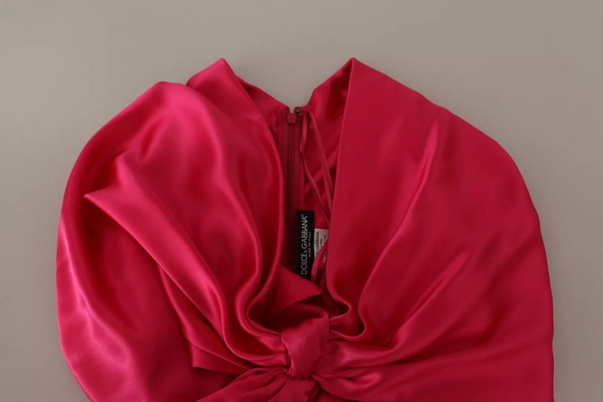 Indulge in the exquisite allure of the Dolce & Gabbana Silk Pink Fitted One Shoulder Midi Dress, a testament to Italian craftsmanship and timeless elegance, perfect for captivating moments.