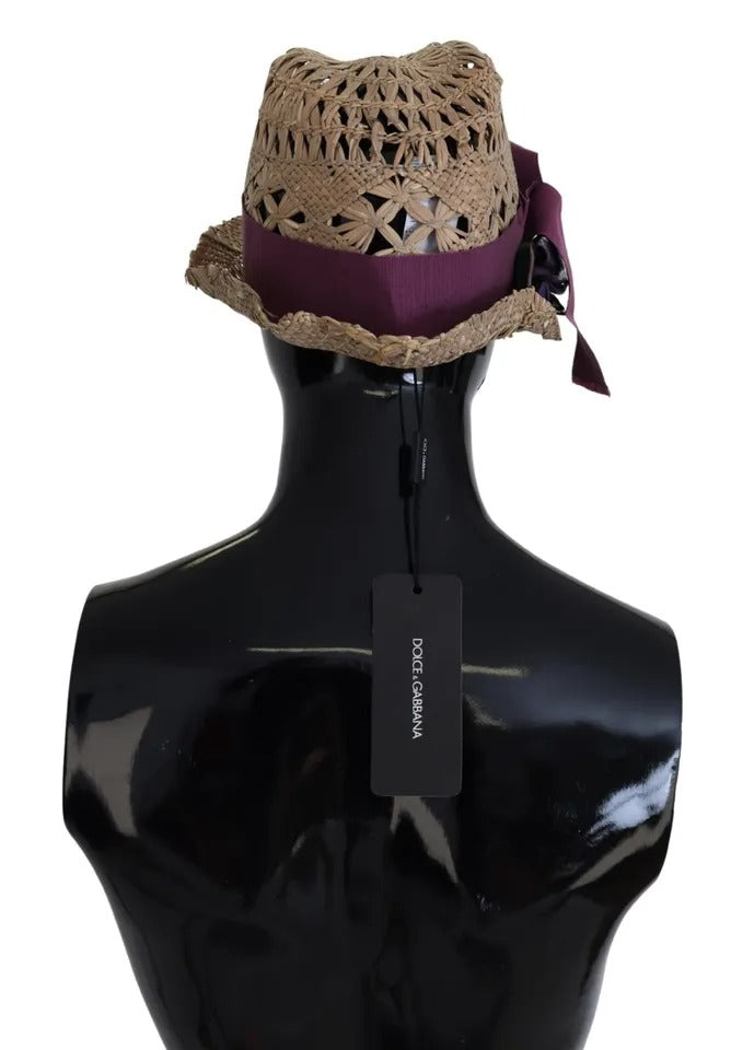 Indulge in the exquisite Dolce & Gabbana Brown Ribbon Floral Embellished Straw Hat, a handcrafted masterpiece that elevates your style with luxurious Italian artistry and timeless elegance.