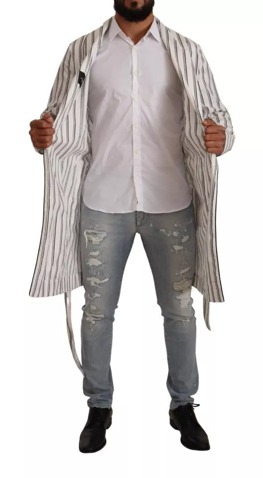 Indulge in the Dolce & Gabbana White Striped Cotton Robe Coat Wrap Jacket, a masterpiece of Italian craftsmanship that elevates your sophisticated allure and timeless elegance.