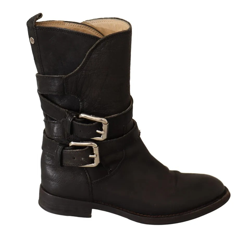 Experience the allure of Dolce & Gabbana's Black Leather Buckle Mid Calf Boots, where exquisite craftsmanship meets timeless elegance, perfect for the discerning connoisseur.