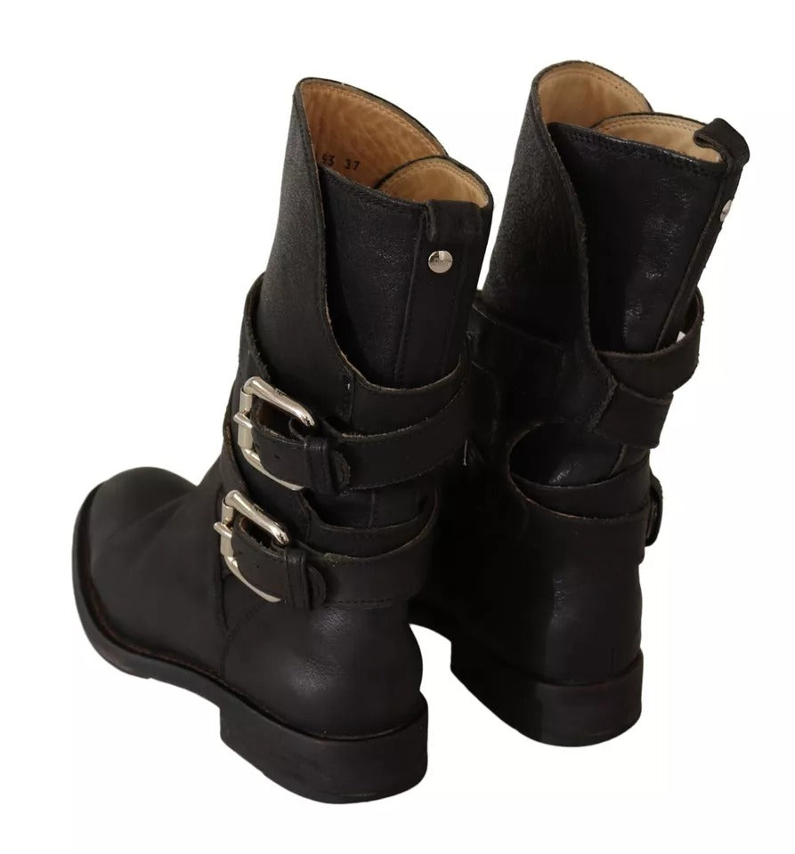 Step into the allure of Dolce & Gabbana's Black Leather Buckle Mid Calf Boots, where exquisite craftsmanship meets timeless elegance, perfect for the discerning individual.