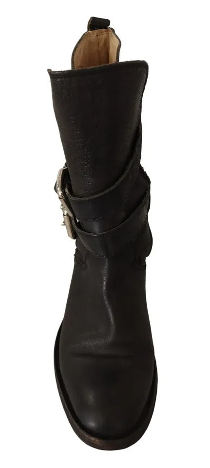 Step into the allure of Dolce & Gabbana's Black Leather Buckle Mid Calf Boots, where exquisite craftsmanship meets timeless elegance, perfect for the discerning connoisseur.