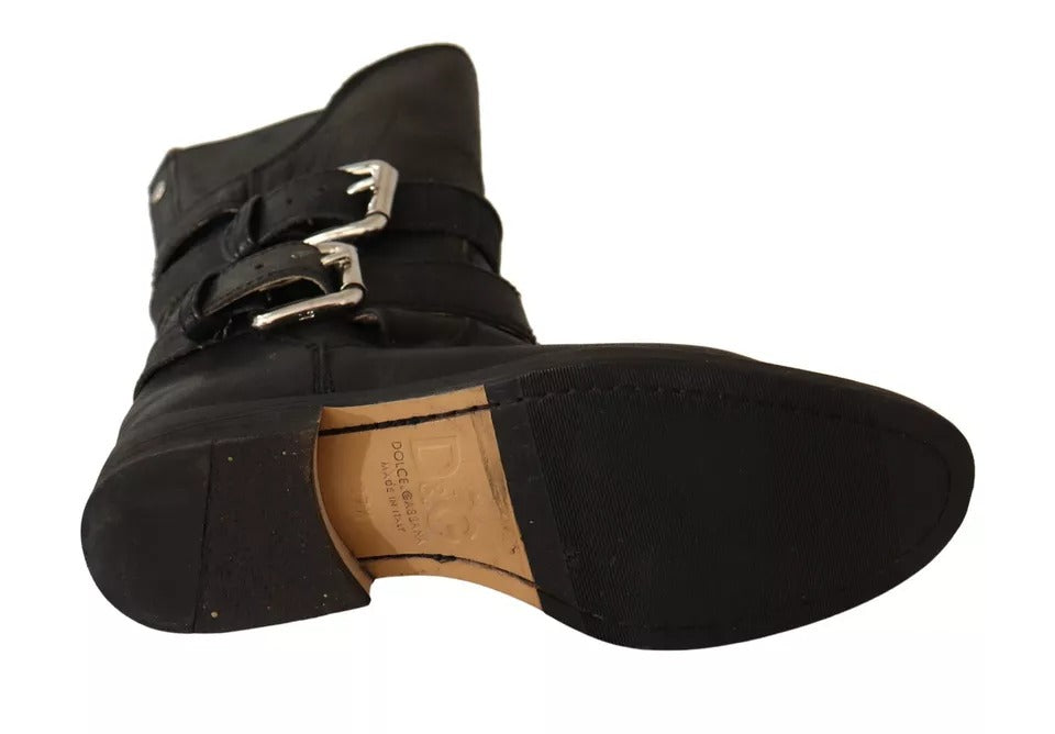 Step into elegance with Dolce & Gabbana's Black Leather Buckle Mid Calf Boots, crafted from premium leather for a timeless allure that transcends occasions.