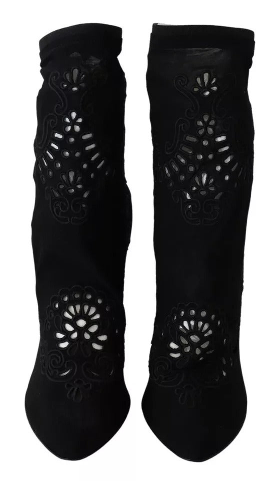 Indulge in the exquisite Dolce & Gabbana Black Stretch Pumps, crafted from luxurious viscose and elastane, embodying timeless elegance and sophistication for the discerning individual.