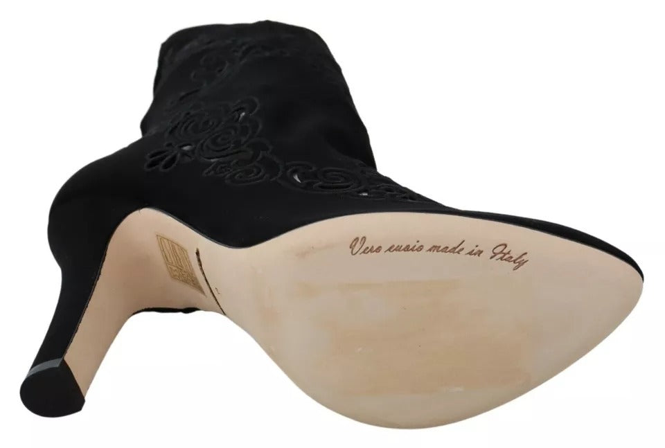 Elevate your style with Dolce & Gabbana Black Stretch Pumps Boots, crafted in Italy from luxurious viscose and elastane, embodying timeless elegance and sophisticated allure.