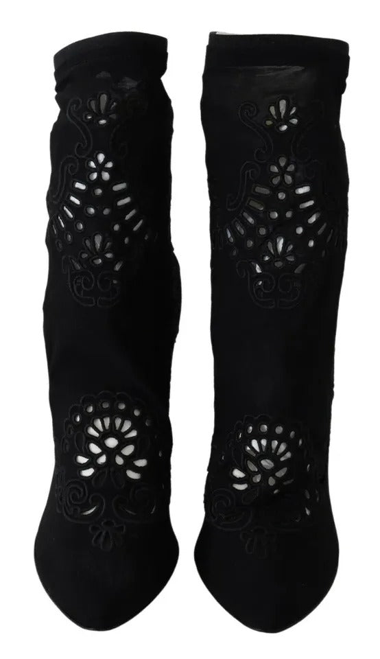 Experience the allure of Dolce & Gabbana's Black Stretch Pumps, where exquisite floral lace meets luxurious craftsmanship, elevating your style to new heights.