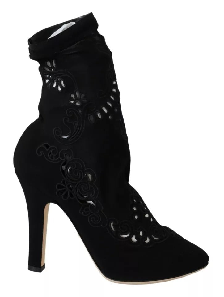 Discover the exquisite Dolce & Gabbana Black Stretch Pumps, where luxurious floral lace meets impeccable Italian craftsmanship, perfect for the discerning fashion connoisseur.