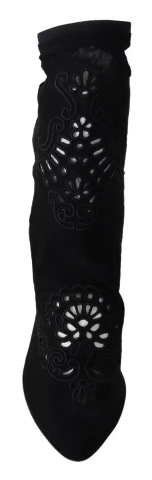 Indulge in the exquisite artistry of Dolce & Gabbana's Black Stretch Pumps, where luxurious floral lace meets impeccable Italian craftsmanship, elevating every occasion with timeless elegance.