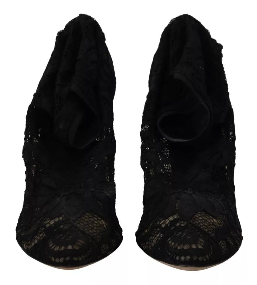 Experience the exquisite craftsmanship of Dolce & Gabbana's Black Stretch Socks Taormina Lace Boots, where timeless elegance meets luxurious comfort, perfect for any occasion.