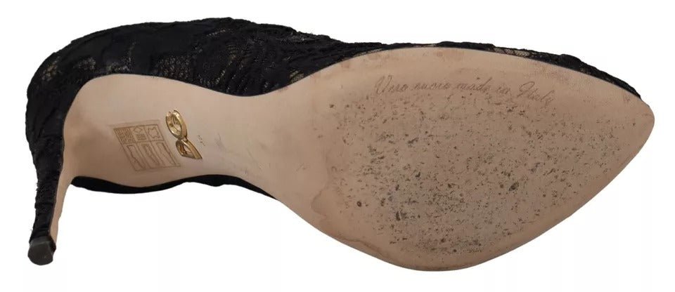 Indulge in the exquisite allure of Dolce & Gabbana's Black Stretch Socks Taormina Lace Boots, where Italian craftsmanship meets timeless elegance for the discerning individual.