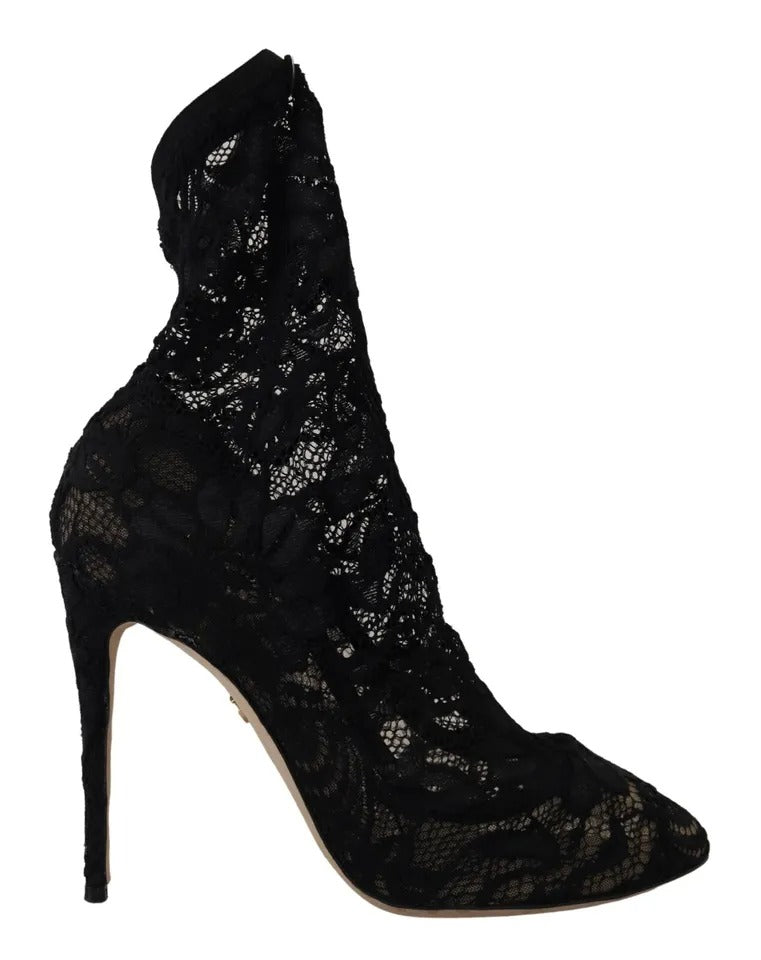 Indulge in the allure of Dolce & Gabbana's Black Stretch Socks Taormina Lace Boots, crafted in Italy with luxurious materials for an exquisite blend of elegance and comfort.
