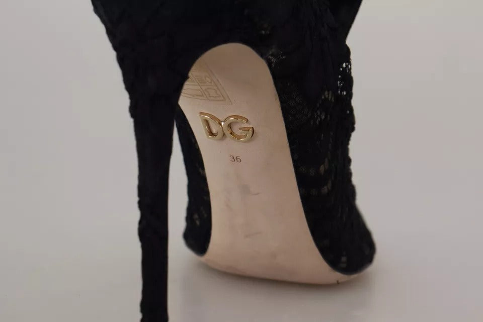 Indulge in the exquisite elegance of Dolce & Gabbana's Black Stretch Socks Taormina Lace Boots, crafted in Italy for unparalleled luxury and timeless allure.