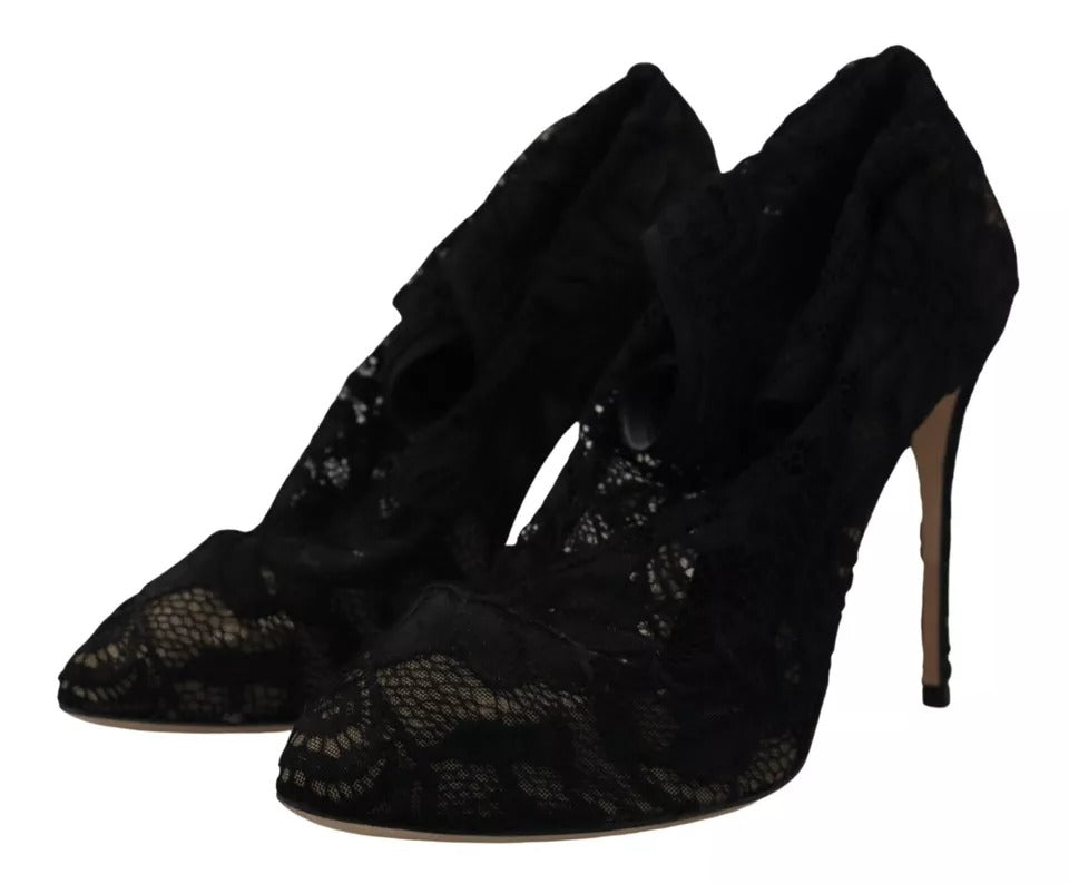 Elevate your style with Dolce & Gabbana's Black Stretch Socks Taormina Lace Boots, where Italian craftsmanship meets luxurious comfort for timeless sophistication.