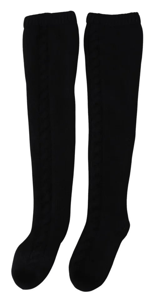 Indulge in the exquisite Dolce & Gabbana Black Wool Knit Calf Long Socks, crafted from 100% virgin wool, embodying timeless elegance and luxurious comfort for discerning tastes.
