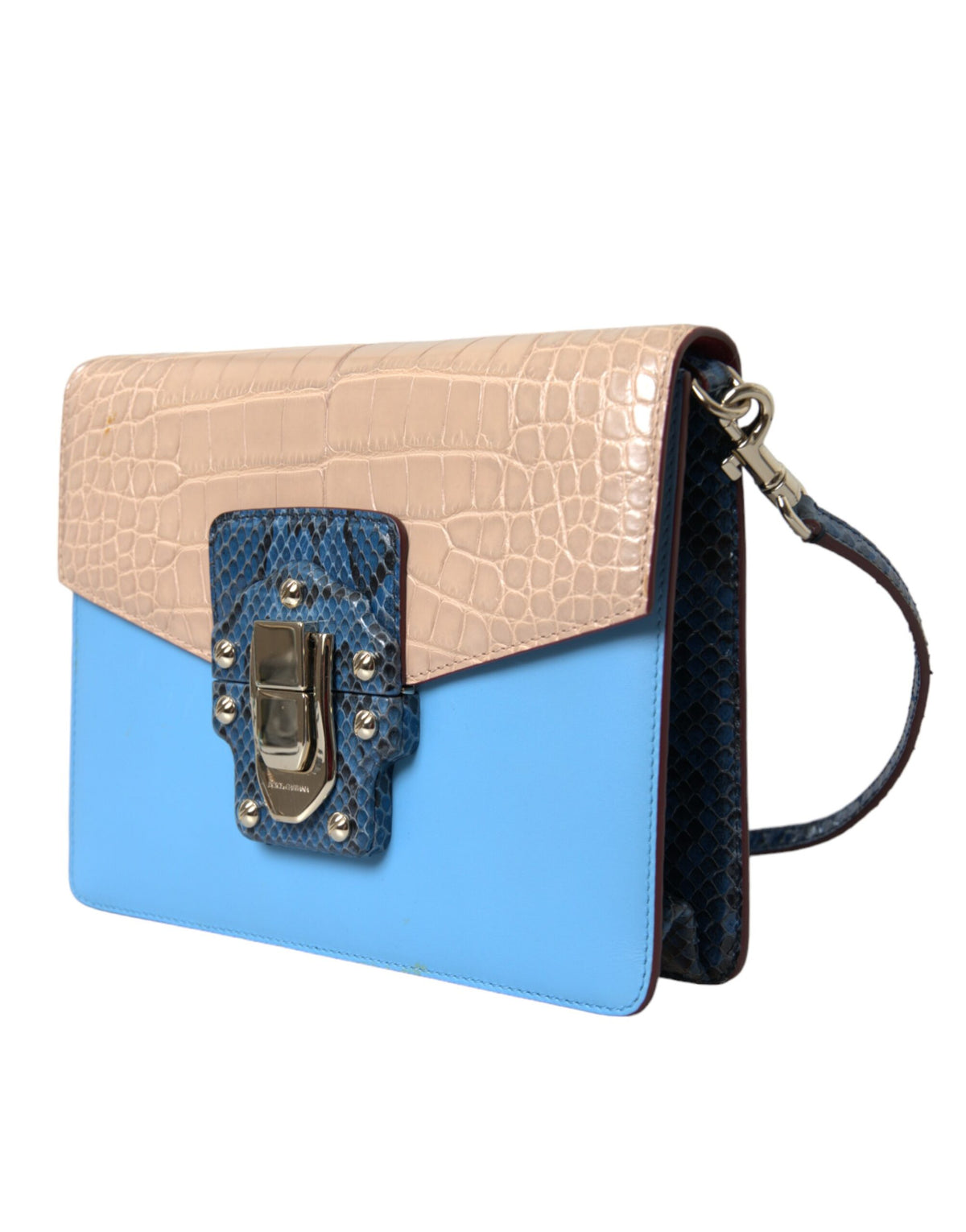 Indulge in the exquisite Dolce & Gabbana LUCIA Crossbody Purse Bag, crafted from luxurious exotic leathers, embodying timeless elegance and artistry for the discerning individual.