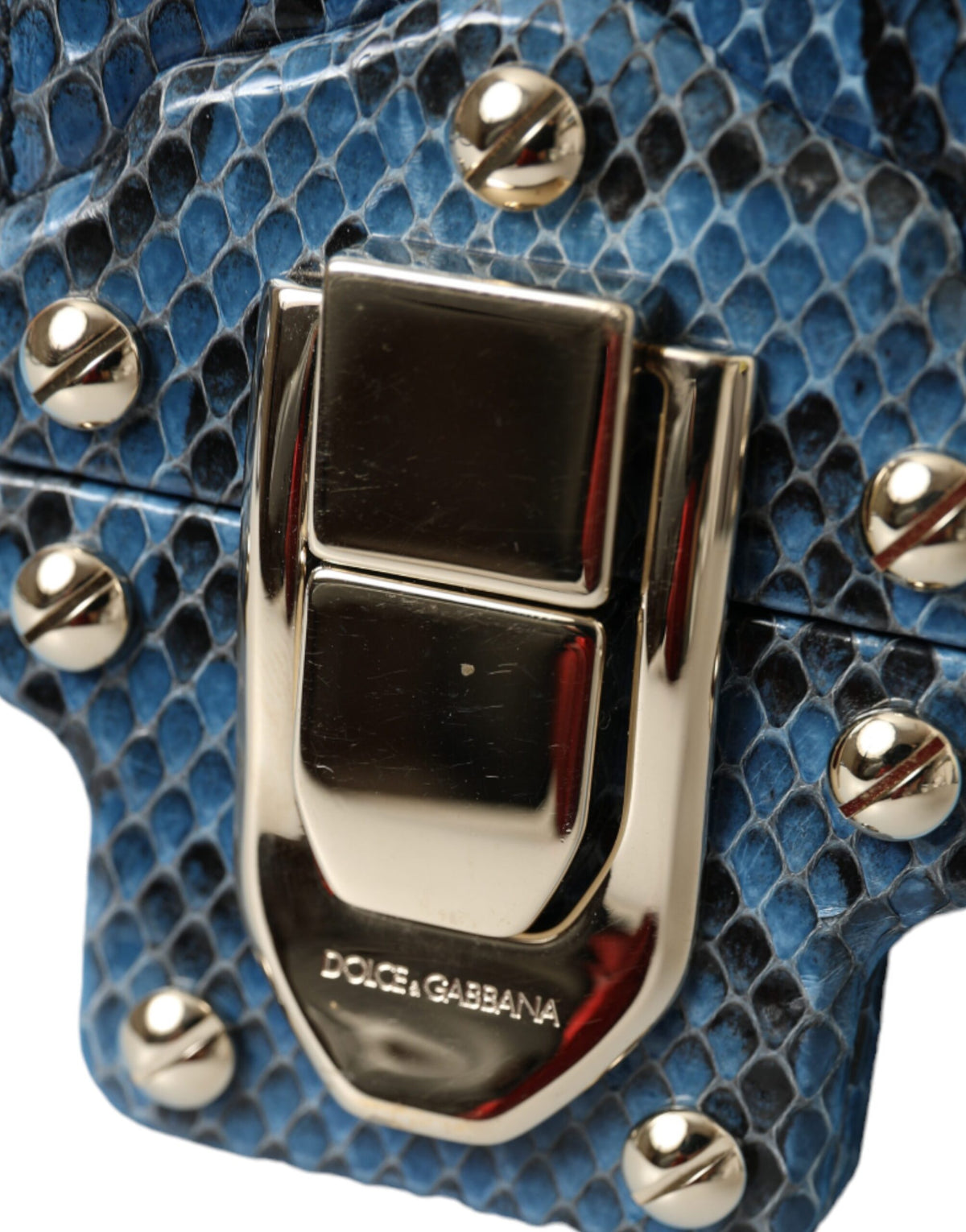 Indulge in the exquisite Dolce & Gabbana LUCIA Crossbody Purse Bag, a masterpiece of exotic leather craftsmanship that embodies timeless luxury and sophistication.