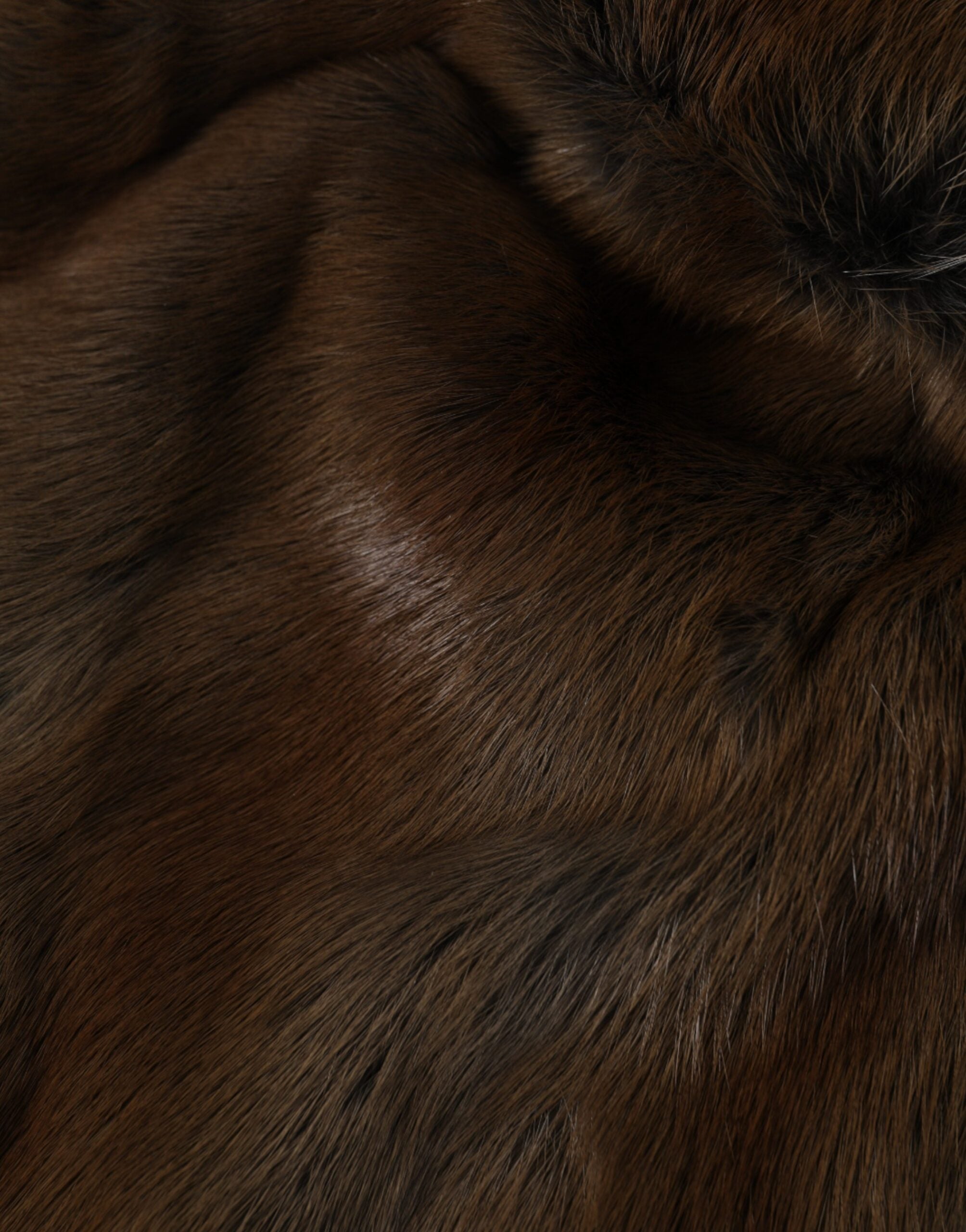 Indulge in the exquisite Dolce & Gabbana Brown Weasel Fur Cashmere Beanie, a luxurious blend of warmth and elegance, perfect for sophisticated autumn outings.