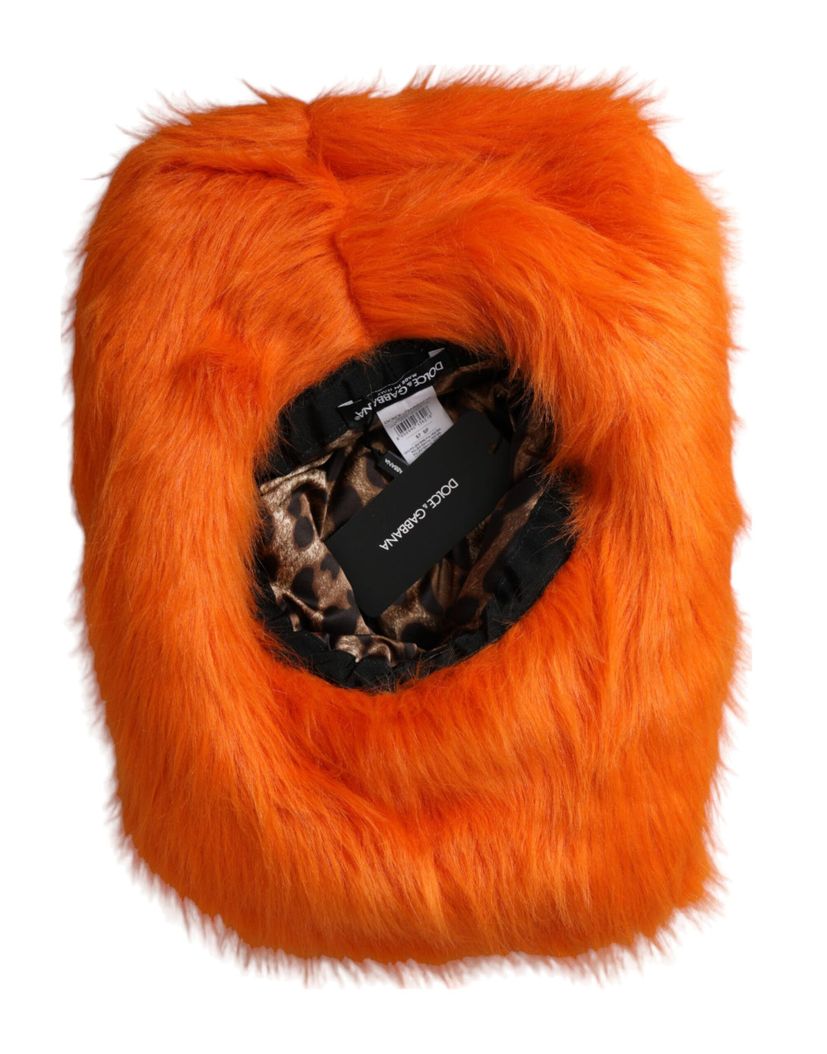 Elevate your style with the Dolce & Gabbana Orange Faux Fur Polyester Fedora Hat, a masterpiece of Italian craftsmanship that embodies luxury and sophistication for the discerning individual.