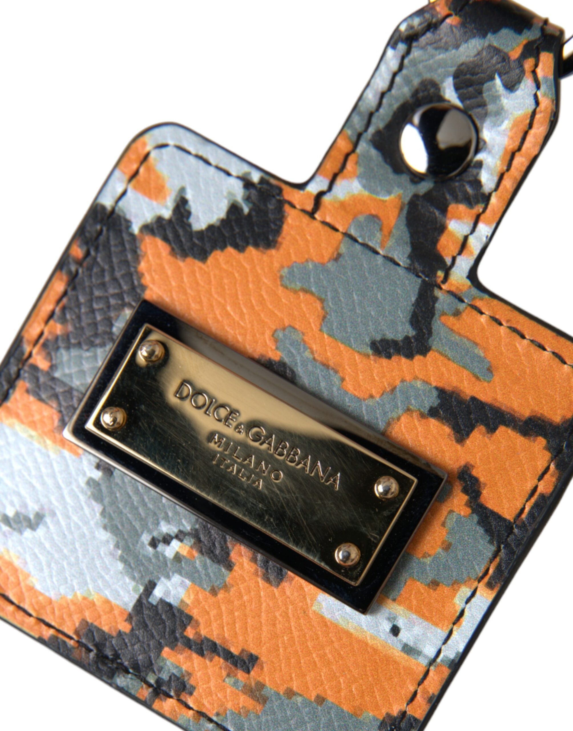 Elevate your style with the Dolce & Gabbana Multicolor Camouflage Print Leather Airpods Case, a luxurious blend of Italian craftsmanship and bold design, perfect for the discerning individual.