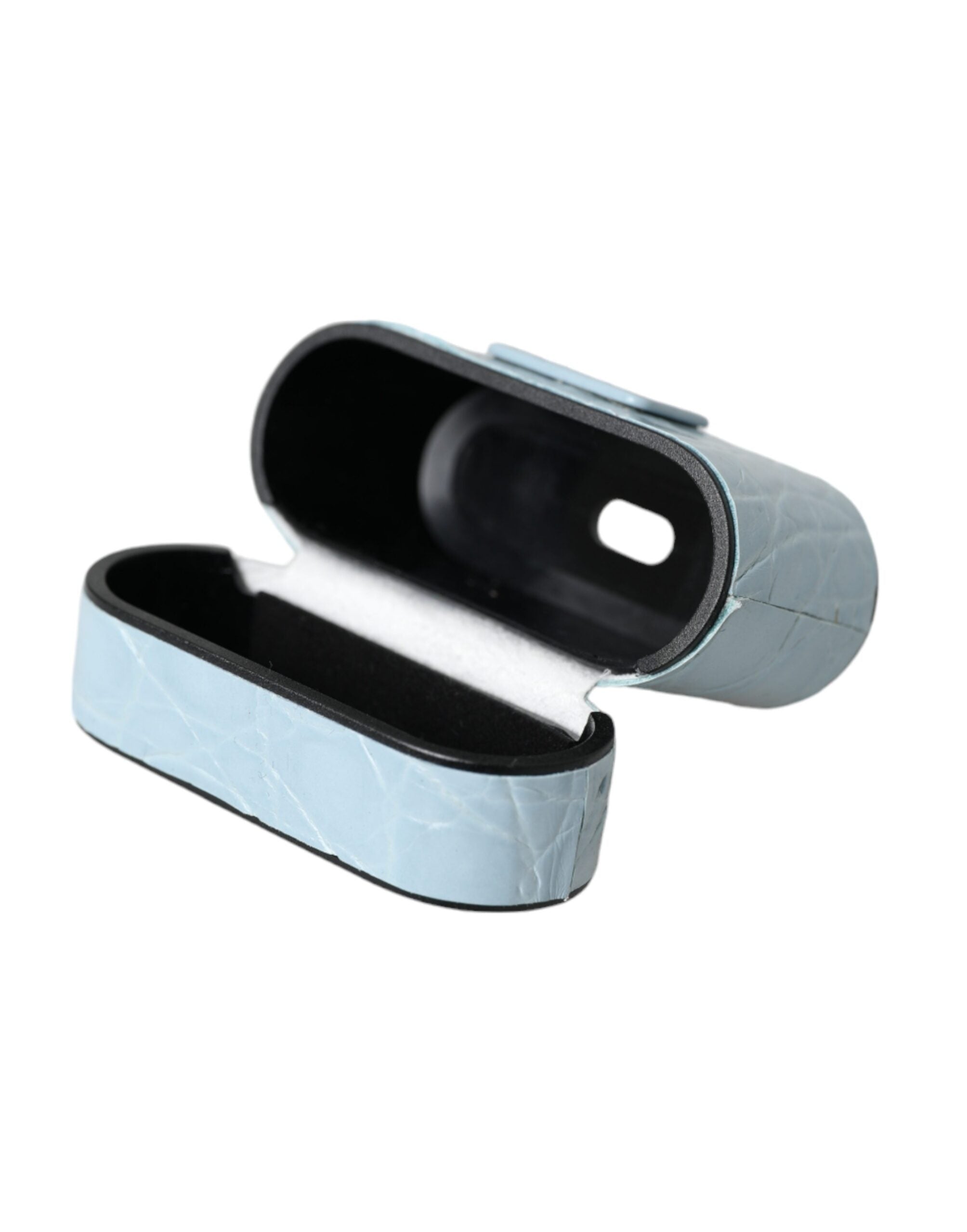 Elevate your style with the Dolce & Gabbana Light Blue Leather Airpods Case, a luxurious blend of 100% Caiman leather and exquisite Italian craftsmanship, embodying sophistication and elegance.