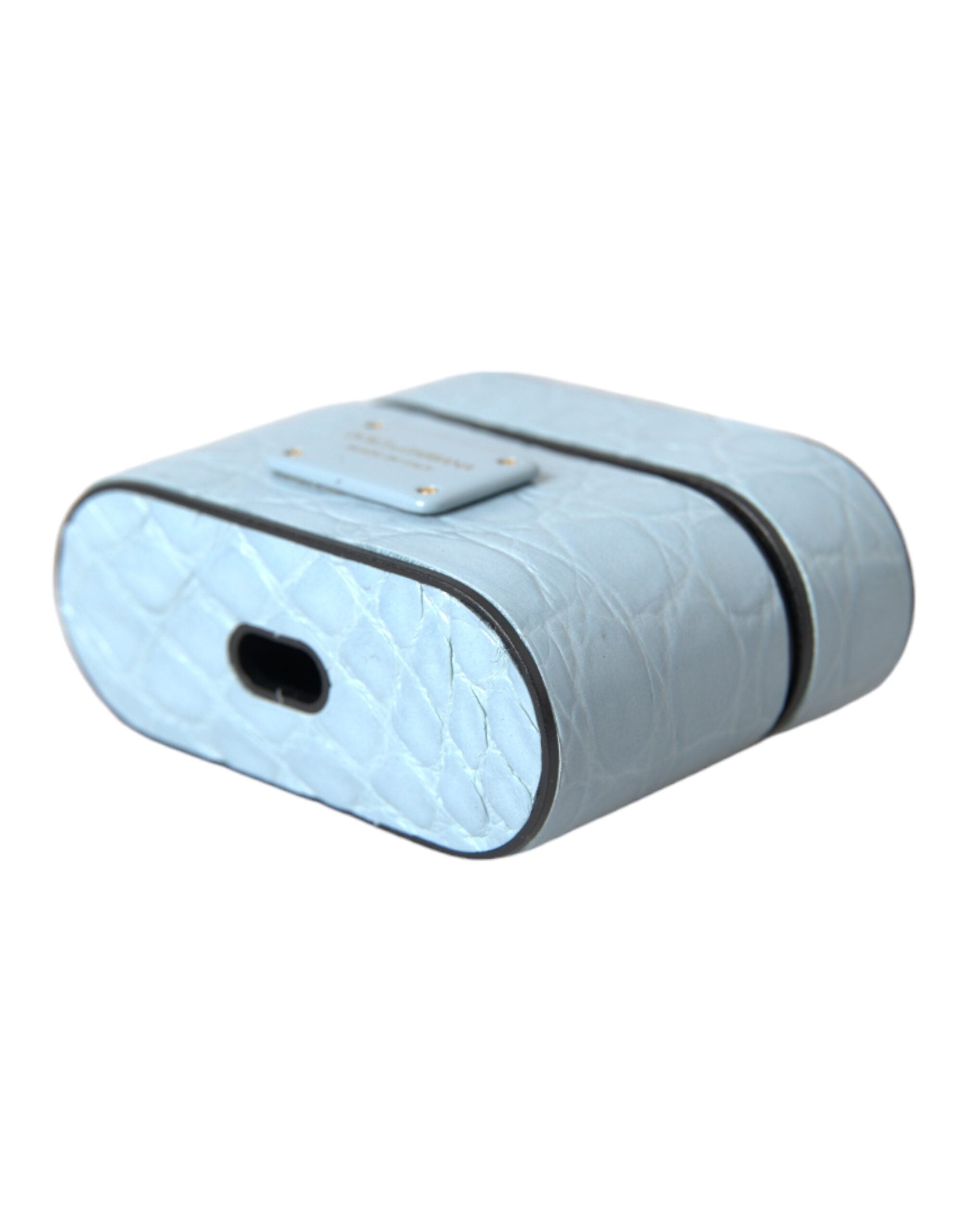 Elevate your style with the Dolce & Gabbana Light Blue Leather Airpods Case, a luxurious blend of 100% Caiman Leather and exquisite craftsmanship for the discerning individual.