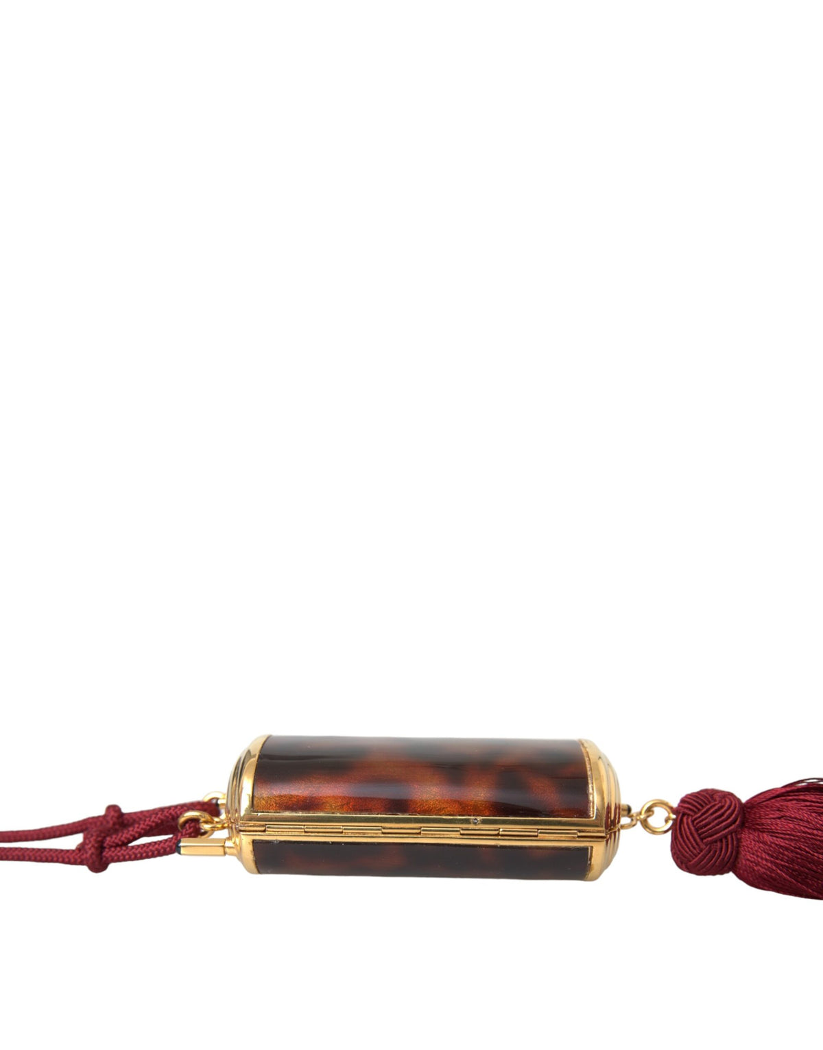 Indulge in the exquisite Dolce & Gabbana Brown Leopard Mini Mirror Tassel Makeup Holder Bag, a luxurious blend of 100% leather and gold detailing, crafted in Italy for the discerning individual.