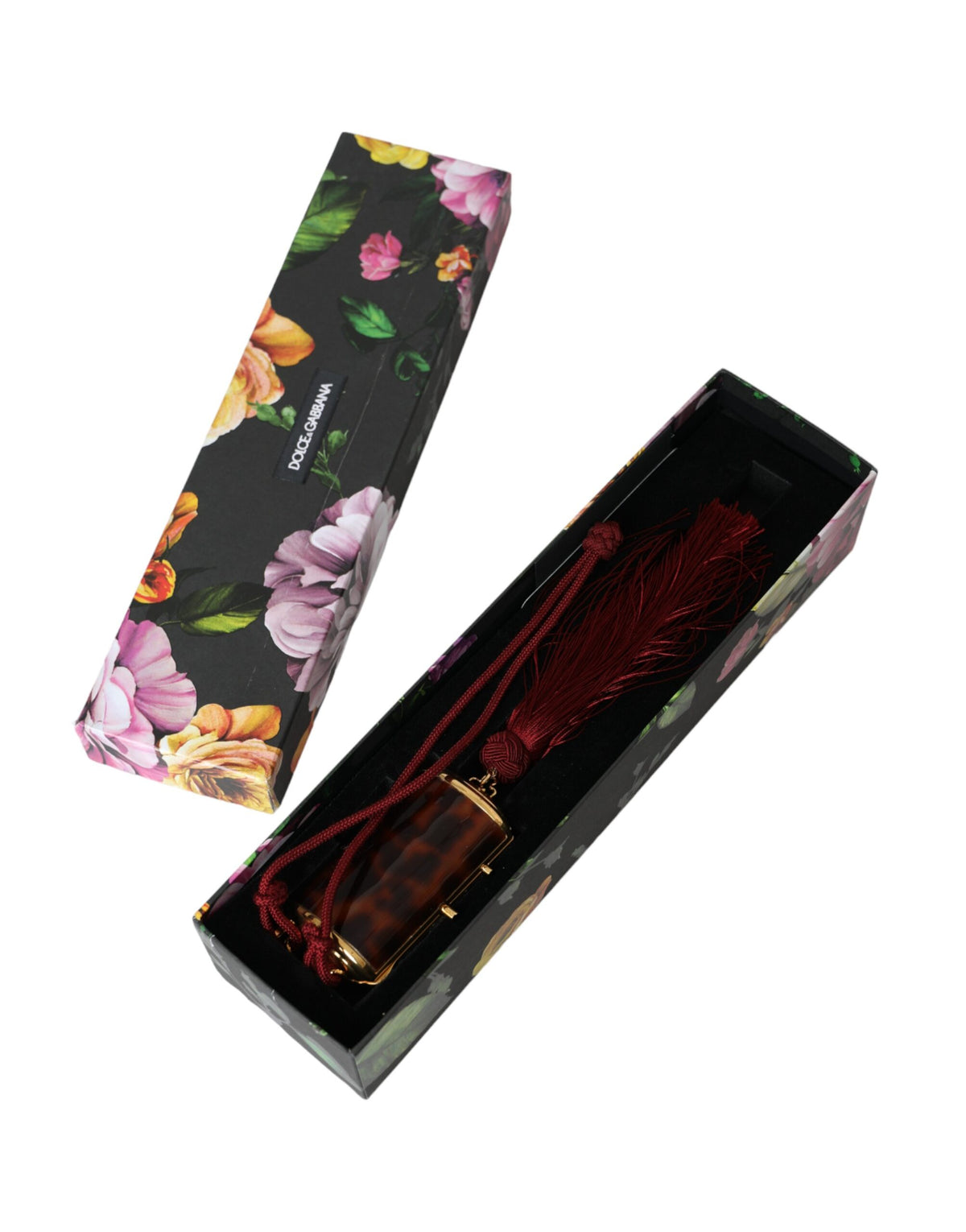 Indulge in the exquisite Dolce & Gabbana Brown Leopard Mini Mirror Tassel Makeup Holder Bag, a luxurious blend of leather and gold detailing, crafted in Italy for the discerning individual.