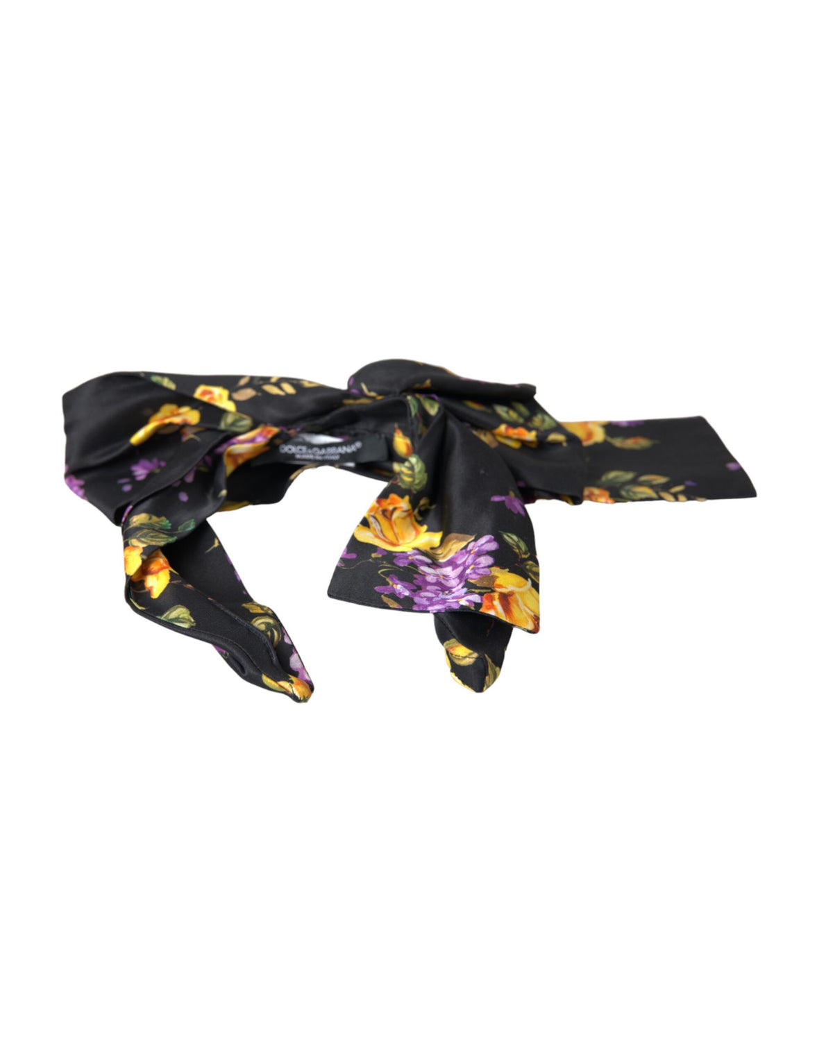Discover the Dolce & Gabbana Black Floral Applique Silk Headband Diadem, a masterpiece of couture craftsmanship that exudes timeless elegance and sophistication.