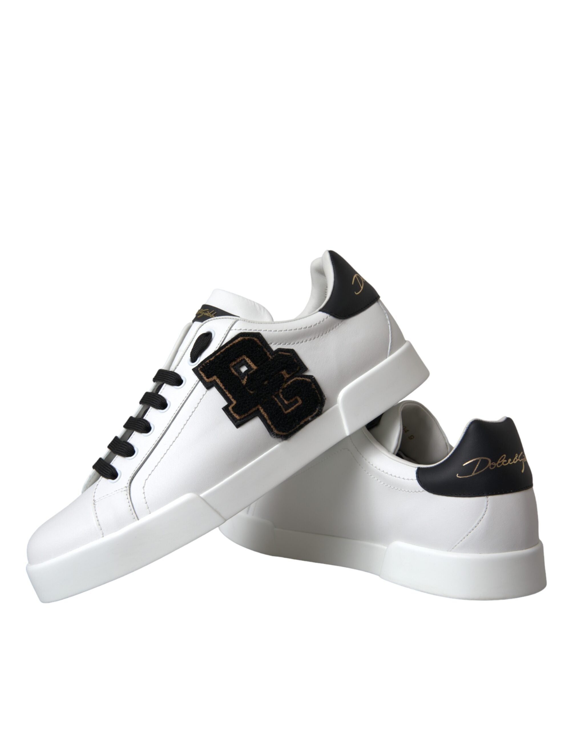Experience the allure of Dolce & Gabbana's White Leather DG Logo Sneakers, where exquisite craftsmanship meets timeless elegance for the discerning individual.
