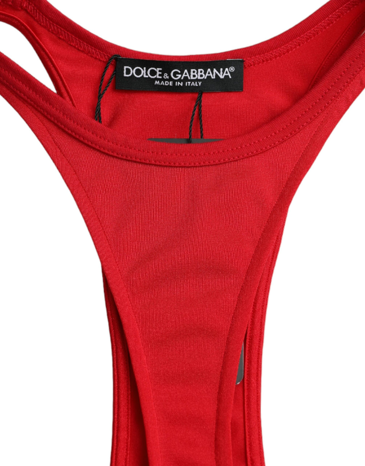 Experience the allure of the Dolce & Gabbana Red Nylon Stretch Bodycon Mini Dress, a masterpiece of Italian craftsmanship that embodies luxury and sensuality for the discerning individual.