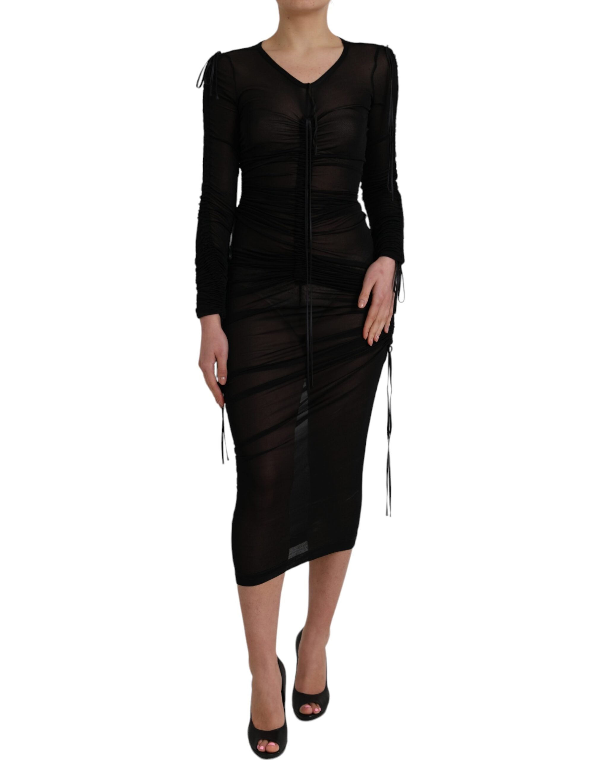 Indulge in the allure of the Dolce & Gabbana Black Sheer Bodycon Midi Dress, a masterpiece of Italian craftsmanship blending silk and viscose for timeless sophistication.