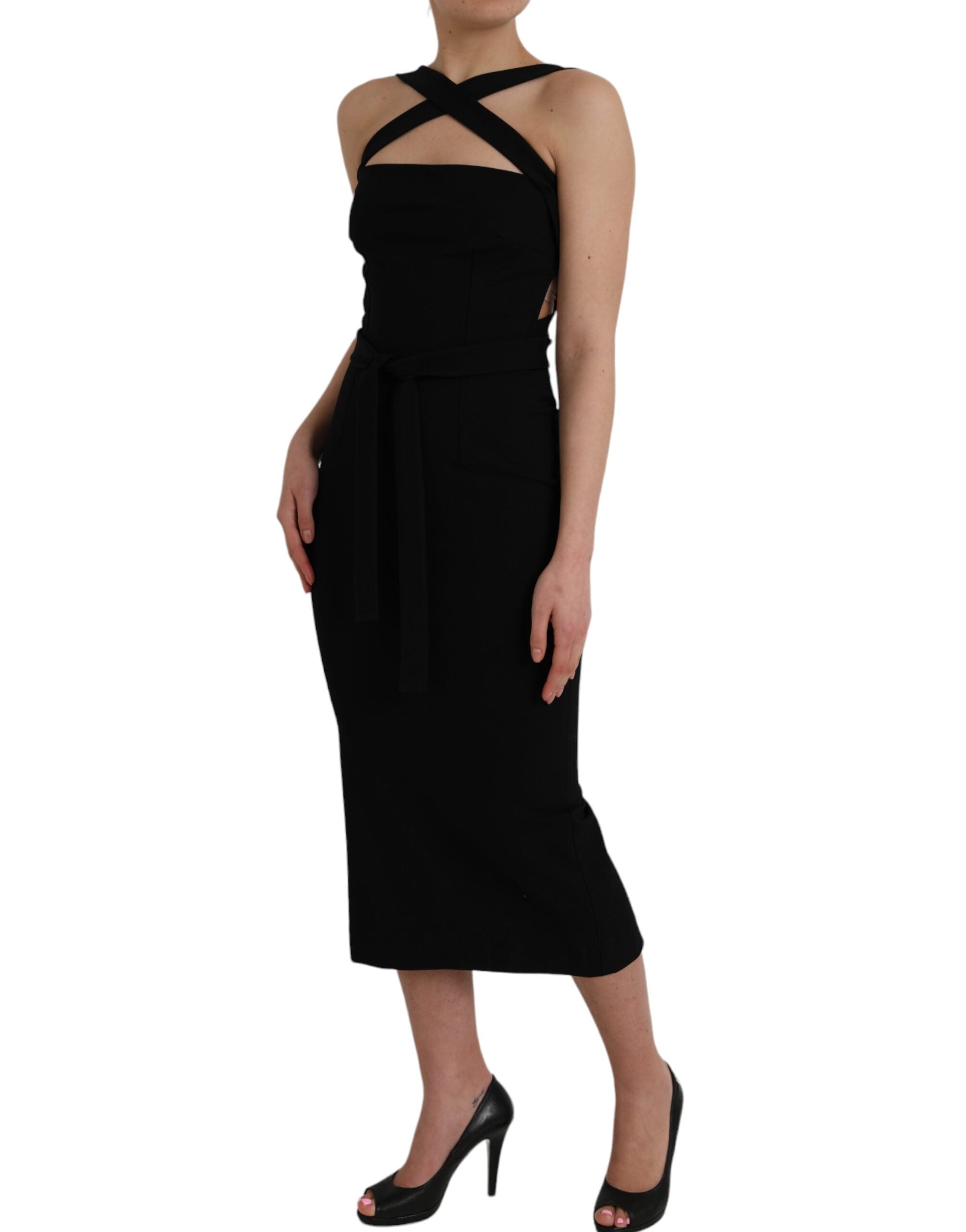 Indulge in the exquisite allure of the Dolce & Gabbana Black Sheath Halter Sleeveless Midi Dress, a masterpiece of Italian craftsmanship that embodies timeless elegance and sophistication.
