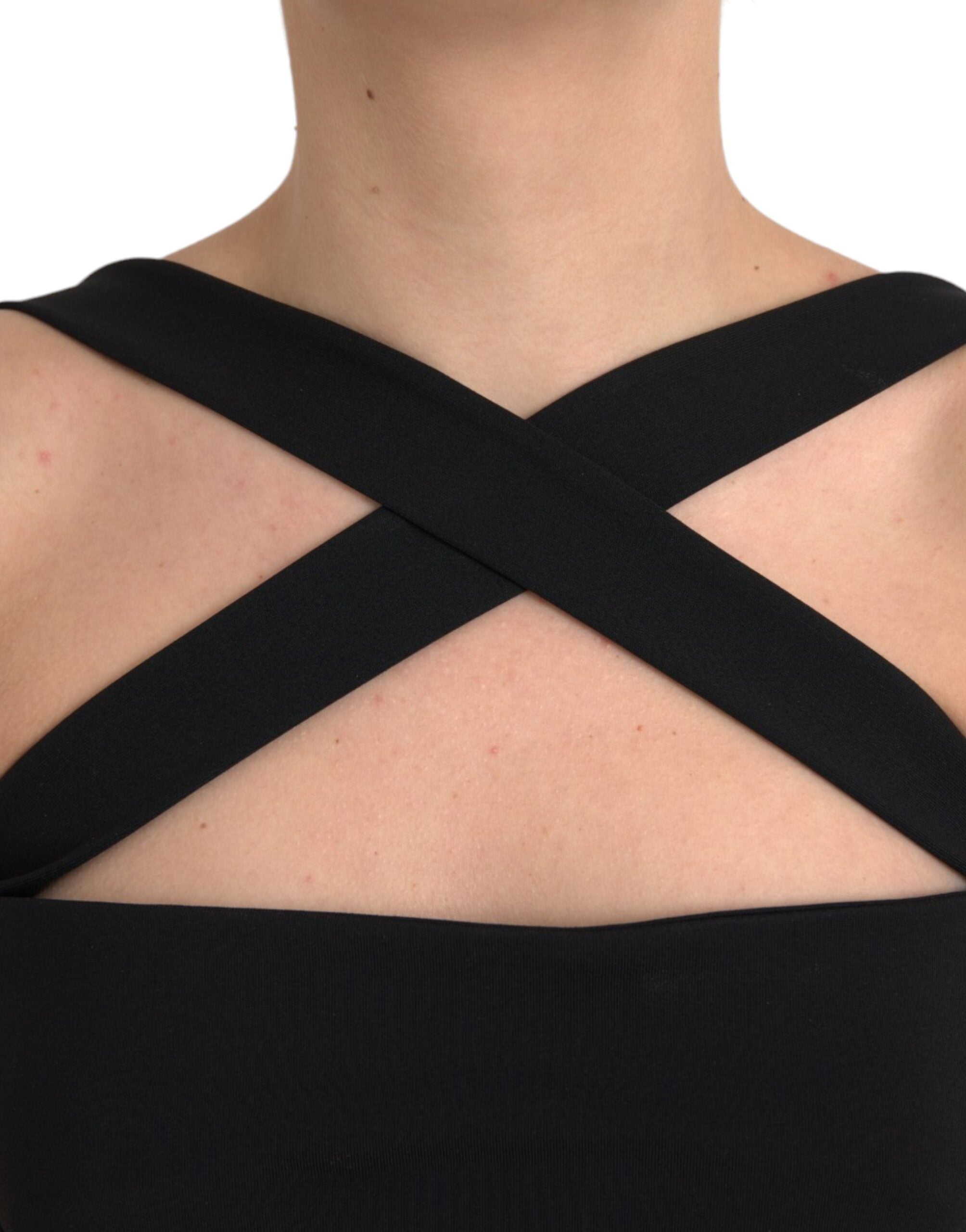 Indulge in the allure of the Dolce & Gabbana Black Sheath Halter Sleeveless Midi Dress, a masterpiece of Italian craftsmanship that embodies timeless elegance and sophistication.