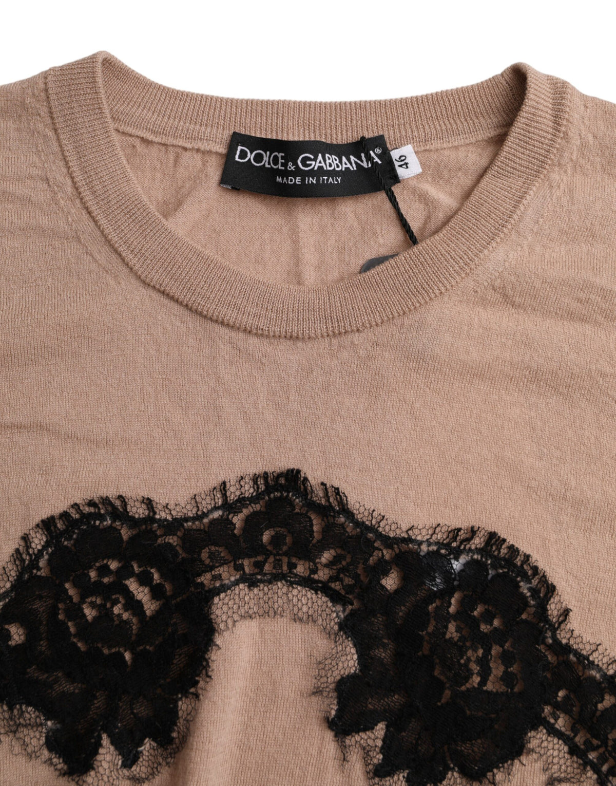 Indulge in the exquisite Dolce & Gabbana Brown Wool Black Lace Blouse, a testament to Italian craftsmanship that embodies timeless elegance and sensual allure.