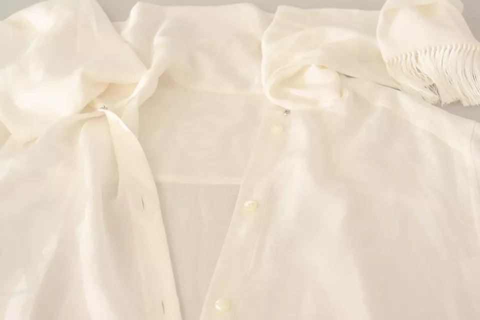 Elevate your wardrobe with the Dolce & Gabbana White Blouse, a luxurious silk and viscose masterpiece that embodies timeless elegance and sophisticated allure.
